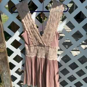 Gorgeous blush lace detailing romper!